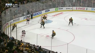 Brad Marchand gets stick to the throat before devils goal
