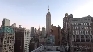 NYC Skyline Empire State Building - drone aerial fly over Manhattan New York City