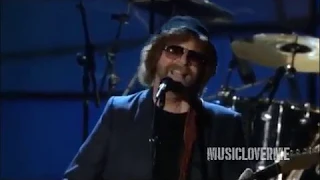 TOM PETTY, JEFF LYNNE, STEVE WINWOOD AND DHANI HARRISON - Handle With Care