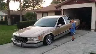My Son hitting switches on our lowrider Cadillac Fleetwood