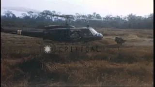 US Army 1st Infantry Division soldiers board UH-1D helicopters during their comba...HD Stock Footage