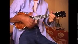 George Harrison plays the Ukulele at home