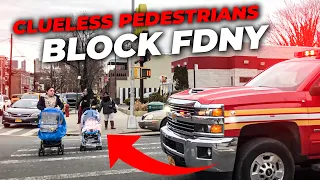 Two idiots don't yield to FDNY Emergency Vehicle & get scolded by police officers