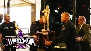 The Andre the Giant Memorial Battle Royal trophy is escorted to the Mercedes Benz Superdome: