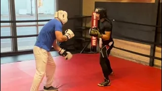 Working and sparring with a young 175 pounder. Light rounds for learning and comfort.