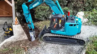 Installing rainwater drainage pipes, Kobelco SK 270SR 1:15 Scale Engcon tiltrotator