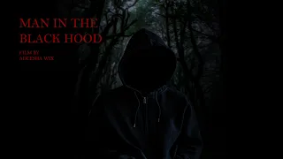 MAN IN THE BLACK HOOD  (01)