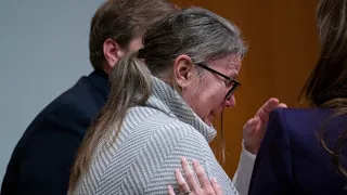 Prosecutor tells jury that mother of Michigan school shooter is at fault for 4 student deaths