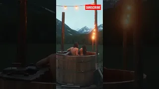 A Couple Relaxing on a Jacuzzi while Looking at the Mountain View