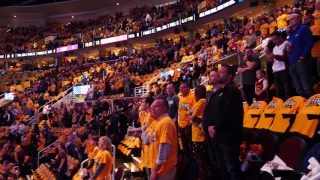 Fans join in singing the National Anthem for Game 2 of the Eastern Conference Semifinals