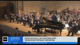 Mayor Michelle Wu plays piano with the Boston Symphony Orchestra