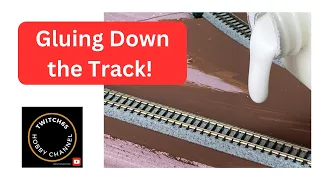 Building N-Scale RailRoad: Gluing down the track