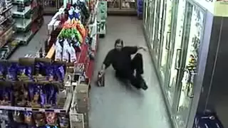 Hillarious Intoxicated Drunk Guy Falling All Over Everything in a Gas Station Must See