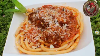 Braised veal in tomato sauce with pasta