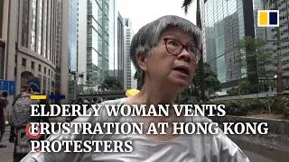 Elderly woman vents frustration at Hong Kong protesters