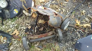 Clean wet grass off mower deck or else