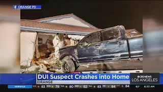 Driver suspected of DUI clips vehicle before plowing into home in Orange