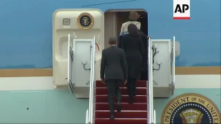 Obamas board Air Force One for flight to Cuba