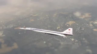 What does it look like to go supersonic at ground level?  (TU-144 Flyover in NYC)