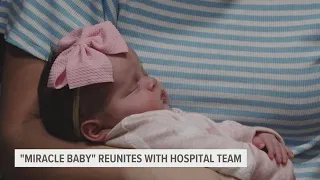 Dubuque miracle baby returns to thank staff that saved her life