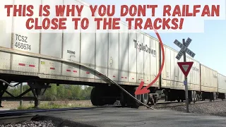 This is why you don't railfan close to the tracks! Roadrailer trailer dragging a side rail