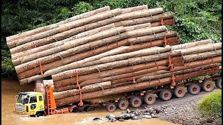 MOST BIGGEST OVERLOADED LOGGING TRUCKS  OVERCOME DANGEROUS CROSSING RIVER OFF ROAD IN WORK