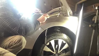 Subaru Forester front left fender paintless dent repair.