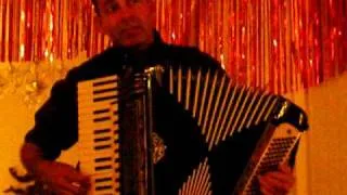 Eshai Plays Accordion