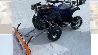 Plowing snow with the Coolster 3125R  125CC  ATV  BLUE