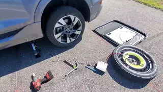 HOW TO CHANGE AN AUDI ETRON FLAT TIRE