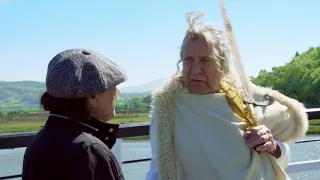 Robert Plant greets Brian Johnson in the Misty Mountains of Wales in his Celtic warrior outfit