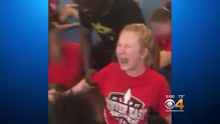 Videos Show School Cheerleaders Forced Into Splits