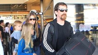 Christian Bale Is Mobbed By Autograph-Seekers When Returning To LA With Family