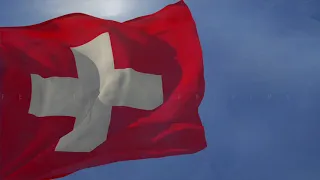 Waving flag and National Anthem of Switzerland