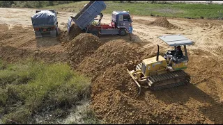 Interesting Best Project Land Filling Construction Skill Operator Dozer Pushing Soil with Truck