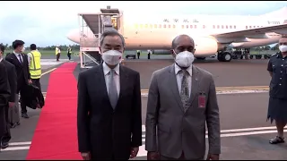 Fijian Minister Jone Usamate welcomes His Excellency Wang Yi at Nausori Airport