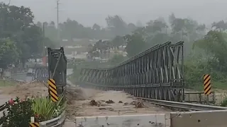 Bridge washes away during Hurricane Fiona