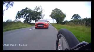 Red Ford Puma very close pass DL70 WVJ Rear to front segment