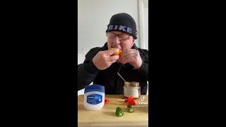 Some old guy eating pepper. But its weird