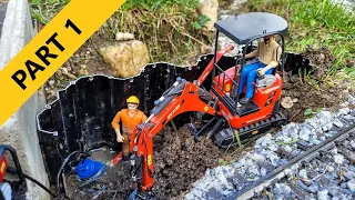 Drilling under the railway with missile mole. RC excavator Liebherr A918, Kubota U17. PART 1