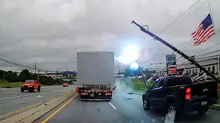 Oversized vehicle brings down poles, wires