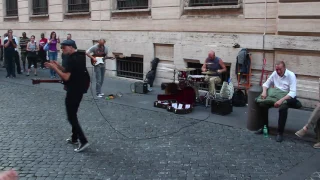 Street musicians in Rome playing Pink Floyd