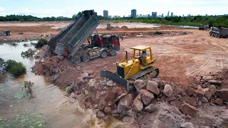 Best Techniques Operator Land Reclamation Bulldozer Pushing Rock Stone, Dump Truck Unloading Rock