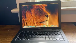 Unboxing and Testing a Late 2006 Black MacBook!