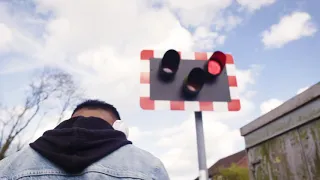 Level crossings - Teenager distracted by music