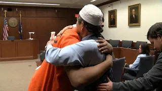 Father forgives, hugs man involved in his son's killing