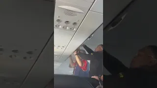 Battery from an electric item caught fire in an overhead bin on a Spirit Flight. Landed Safely