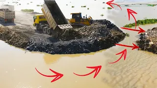 Huge Pond Fill Up By Nice Activities Machines Using Bulldozer Push Stone In To Water & Dumper Truck