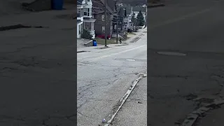 Kid dressed up like Michael Jackson dancing in street