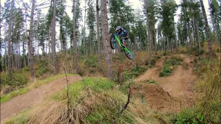 Mountain bike kid take an insane fall in to a tree stump